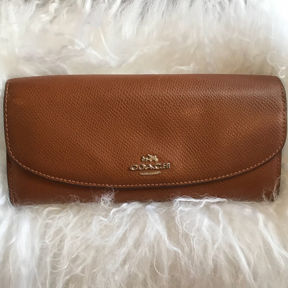 Coach wallet/sold